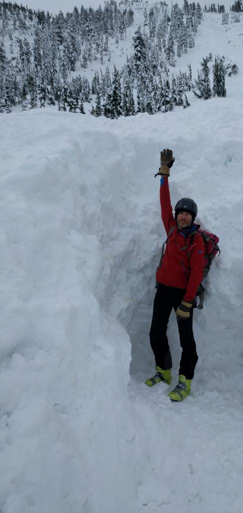  Standing in the hole where the skier was buried. He was buried prone in the area at my feet. 