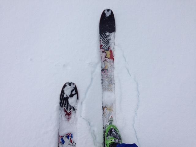  Cracking around skis into non frozen <a href="/avalanche-terms/rain-crust" title="A clear layer of ice formed when rain falls on the snow surface then freezes." class="lexicon-term">rain crust</a> 