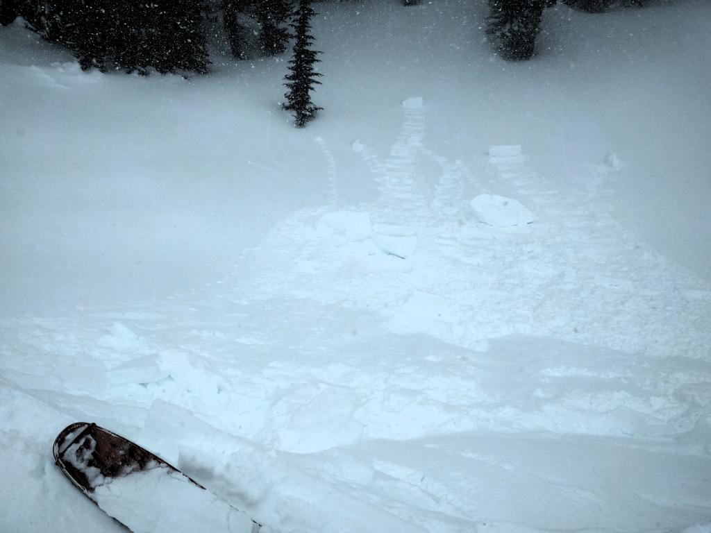  Debris from the <a href="/avalanche-terms/cornice" title="A mass of snow deposited by the wind, often overhanging, and usually near a sharp terrain break such as a ridge. Cornices can break off unexpectedly and should be approached with caution." class="lexicon-term">cornice</a> failure 