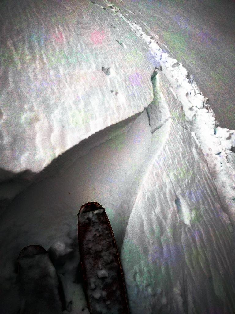  <a href="/avalanche-terms/wind-slab" title="A cohesive layer of snow formed when wind deposits snow onto leeward terrain. Wind slabs are often smooth and rounded and sometimes sound hollow." class="lexicon-term">Wind slab</a> cracking in an undercut wind-<a href="/avalanche-terms/loading" title="The addition of weight on top of a snowpack, usually from precipitation, wind drifting, or a person." class="lexicon-term">loaded</a> slope 
