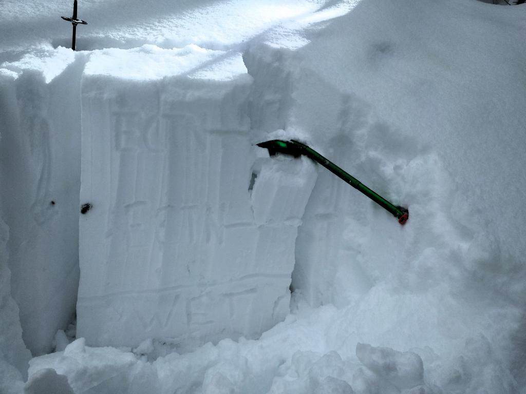  ECTN results at two locations in the <a href="/avalanche-terms/snowpit" title="A pit dug vertically into the snowpack where snow layering is observed and stability tests may be performed. Also called a snow profile." class="lexicon-term">pit</a>. The <a href="/avalanche-terms/rain-crust" title="A clear layer of ice formed when rain falls on the snow surface then freezes." class="lexicon-term">rain crust</a> from the start of the storm is at the bottom and the snow below that was still wet. NW <a href="/avalanche-terms/aspect" title="The compass direction a slope faces (i.e. North, South, East, or West.)" class="lexicon-term">aspect</a> at 7500 ft. 