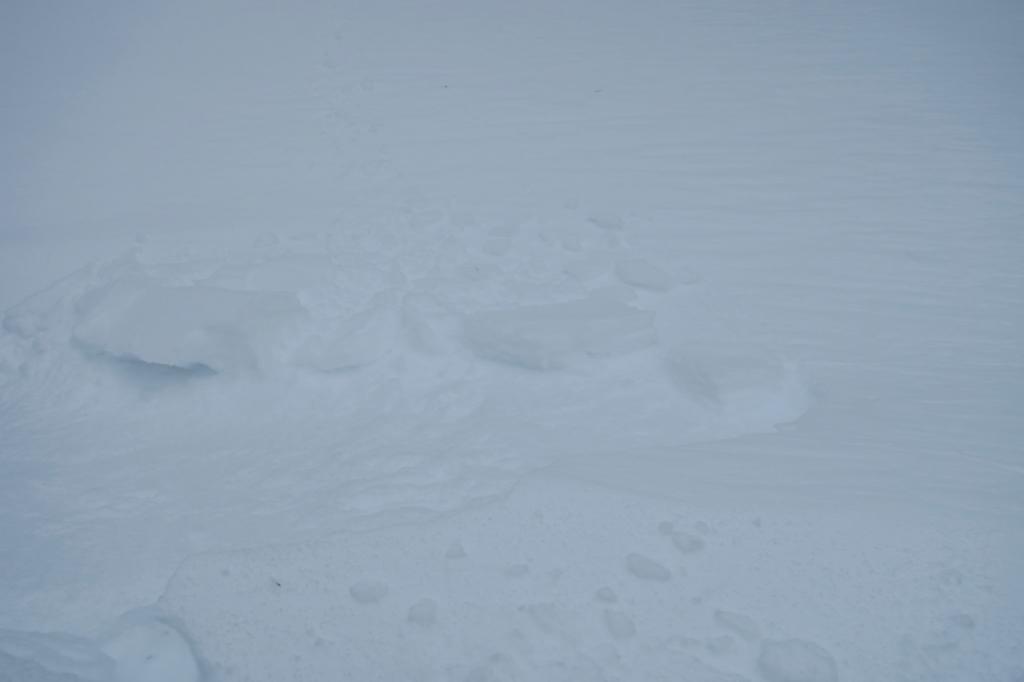  Small test slope that failed under a ski kick. 