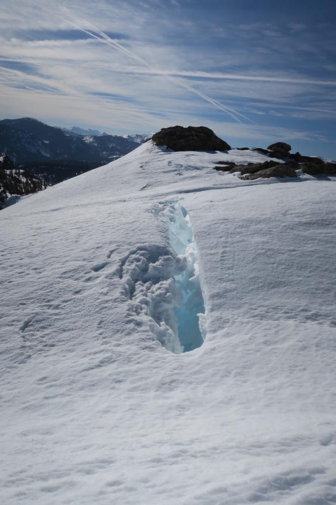  Huge crevasse where the east facing slope meets the flat ridge. 