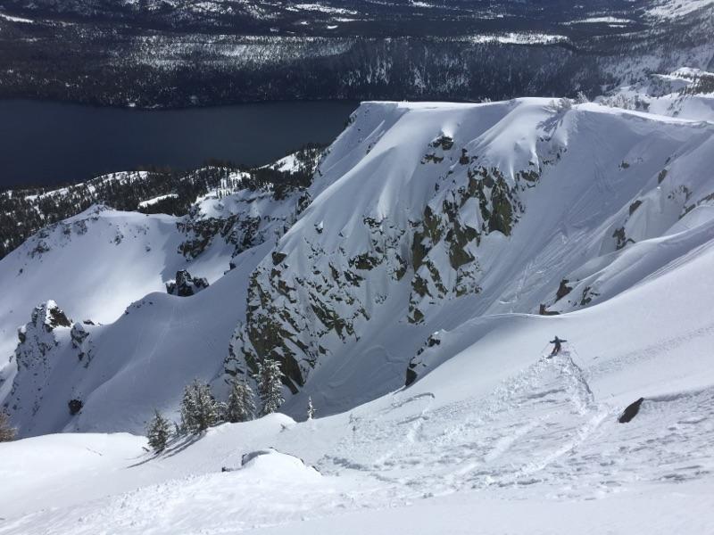  Skier descending onto slope before <a href="/avalanche-terms/avalanche" title="A mass of snow sliding, tumbling, or flowing down an inclined surface." class="lexicon-term">avalanche</a>. 