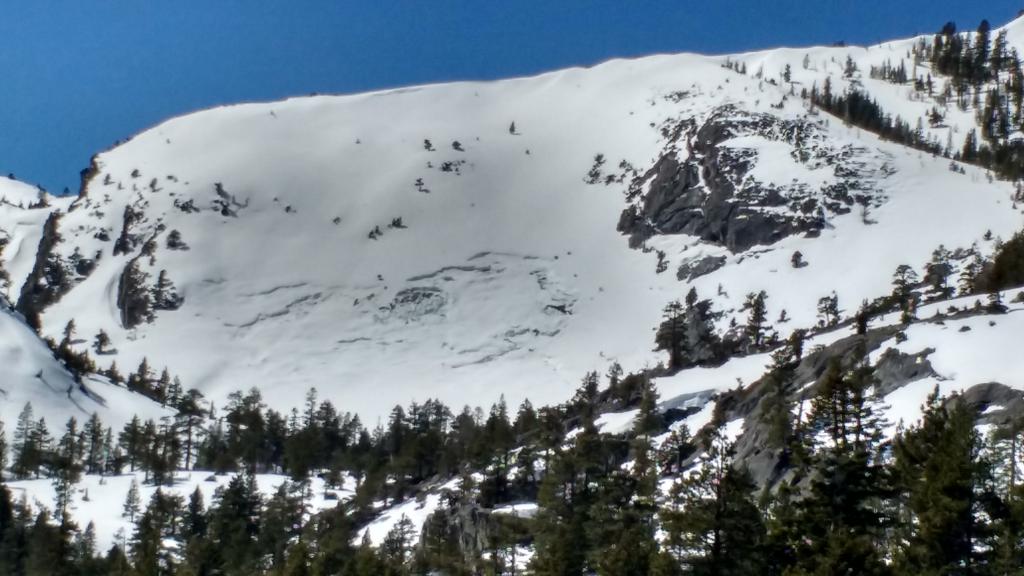  March 28-<a href="/avalanche-terms/glide" title="When the entire snowpack slowly moves as a unit on the ground, similar to a glacier." class="lexicon-term">Glide</a> crack as seen from Emerald Bay - Possibly some recent activity near one of the middle cracks.. 
