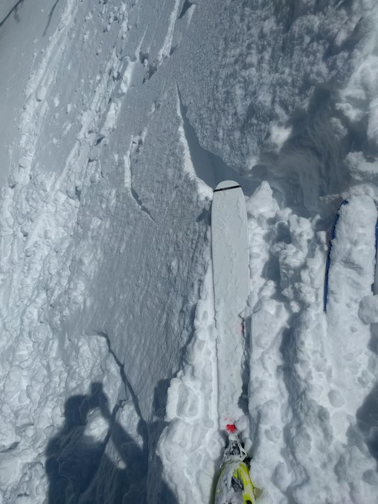  <a href="/avalanche-terms/wind-slab" title="A cohesive layer of snow formed when wind deposits snow onto leeward terrain. Wind slabs are often smooth and rounded and sometimes sound hollow." class="lexicon-term">Wind slab</a> cracking on a NE <a href="/avalanche-terms/aspect" title="The compass direction a slope faces (i.e. North, South, East, or West.)" class="lexicon-term">aspect</a> undercut slope at 9200 ft. 
