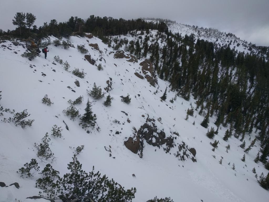  Numerous rocks still visible in the start zones of the far east ridge of Tamarack. Some small gullies did have continuous snow coverage with weak snow near the base. 