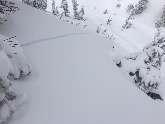  Large shooting cracks where storm snow sits on top of old near surface <a href="/avalanche-terms/faceted-snow" title="Angular snow with poor bonding created from large temperature gradients within the snowpack." class="lexicon-term">facets</a>.  9400&#039; N <a href="/avalanche-terms/aspect" title="The compass direction a slope faces (i.e. North, South, East, or West.)" class="lexicon-term">aspect</a>. 