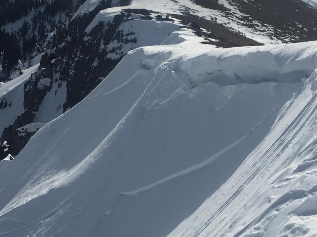 Old <a href="/avalanche-terms/wind-slab" title="A cohesive layer of snow formed when wind deposits snow onto leeward terrain. Wind slabs are often smooth and rounded and sometimes sound hollow." class="lexicon-term">wind slab</a> <a href="/avalanche-terms/avalanche" title="A mass of snow sliding, tumbling, or flowing down an inclined surface." class="lexicon-term">avalanche</a> above Deep Creek 