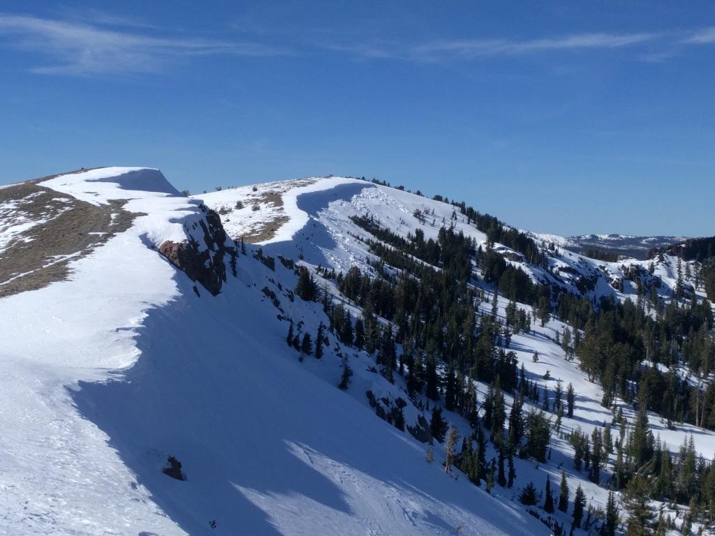  Recent <a href="/avalanche-terms/cornice" title="A mass of snow deposited by the wind, often overhanging, and usually near a sharp terrain break such as a ridge. Cornices can break off unexpectedly and should be approached with caution." class="lexicon-term">cornice</a> <a href="/avalanche-terms/collapse" title="When the fracture of a lower snow layer causes an upper layer to fall. Also called a whumpf, this is an obvious sign of instability." class="lexicon-term">collapses</a> and good snow cover on NE <a href="/avalanche-terms/aspect" title="The compass direction a slope faces (i.e. North, South, East, or West.)" class="lexicon-term">aspects</a>. 