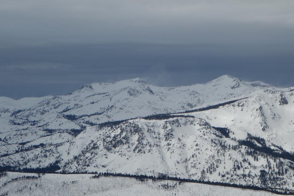  Snow blowing of the Crystal Range Peaks. 