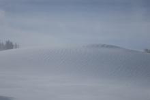 Wind affected snow near summit.