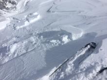 Small new wind slabs were forming on N-NE-E aspects near summit ridge.