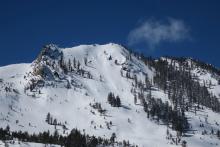 Late morning view of south east face of Flagpole peak, showing previous natural slide activity.