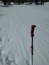 Runnels in the snow surface caused by warming and melting. 