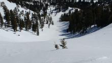 Runnels creating less than smooth snow surfaces on ESE aspects (photo left), transitioning to smooth on NE aspects (photo right).