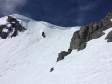 Sagging cornices with debris from recent cornice failures widespread.