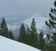 Looking southwest.  Rain on Donner Peak