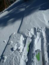 Very small wind slab bordering a wind-scoured icy rain crust on a NE aspect at 8200 ft. 