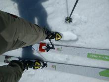 1 to 2 inches of corn snow on top of a supportable melt-freeze crust on a SW aspect at 8200 ft. around 11:45 am