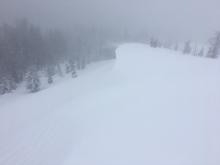 Wind loading with large built out cornices along upper ridge.