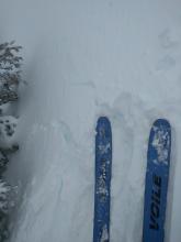 Ski cuts triggered small cracking on a wind-loaded test slope near the summit of Hidden Peak.