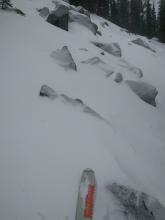 Large exposed anchors (aka rocks, stumps, logs, etc) on a north aspect at 8600 ft