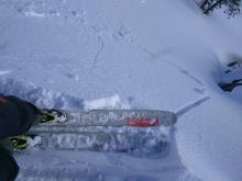 Shooting cracks triggered by ski kicks on an E facing wind-loaded test slope at 7900 ft.