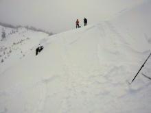 Small wind slab failure resulting from a ski cut on a small wind-loaded test slope near the ridge at 9700 ft. on a NE aspect.