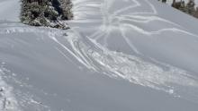 Intentionally cracked wind slab along summit ridge near noted lat/long.