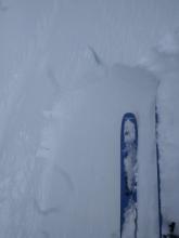 Small wind slab triggered by a ski kick on a wind-loaded test slope on the far east ridge of Tamarack Peak.
