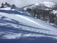 Wind textured surface snow on Far East Ridge.