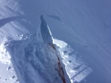 Stubburn wind slabs with cracking and shooting cracks in wind loaded terrain. 