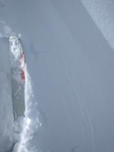 Small cracking on a wind-loaded test slope along the ridge. NE aspect 8100 ft.