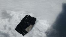 2 inches of surface wet snow. Rain crust below glove providing supportability.
