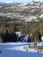 Snow cover on N aspects and lack of snow cover on S aspects in the distance