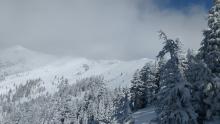 Blowing snow along the Castle Pk - Basin Pk ridgeline. No signs of new wind slab formation.