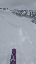 Newly formed wind slab fractured by a ski cut on this test slope. Moderate amounts of blowing snow.