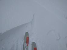 The same test slope after a few more stomps. The wind slab slid down the small test slope.