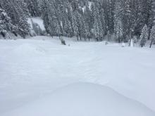 Looking down on the slide. Skiers left flank is out of frame.