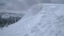 The second of two intentionally skier triggered wind slabs in E aspect terrain above treeline.