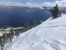 Wind scoured snow at tree line.