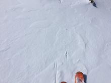 Scouring to very firm rain crust along summit ridge at 9,200'.