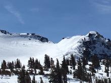 Not visible in this photo, but some blowing snow and scouring of slope and cornices in the summit bowl.