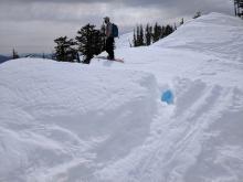 Cracking and hollowed out snow along cornice