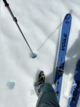 Boot top deep wet snow on an E aspect at 7100 ft. at 11 am. The snow was still barely ski supportable at this time.