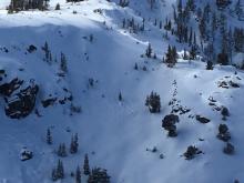 Wind slab avalanche with debris covered up by additional snow