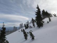 Lenticular clouds and some wind transport along the Sierra Crest near Twin Peaks.