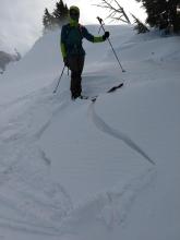 Small wind pillow with some cracking. The wind slab only extended a few feet downslope.