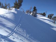 Jumping on several summit ridge wind loaded test slopes produced little to no failure of wind slabs.